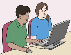 Ein Mann und eine Frau sitzen am Computer